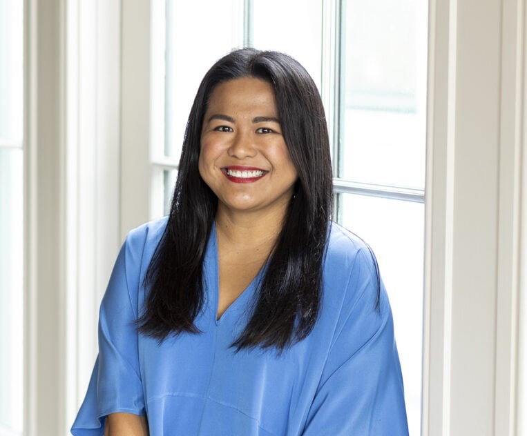 June Rodil wearing a blue dress